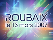 Text 'ROUBAIX le 13 mars 2007' with colorful abstract geometric background