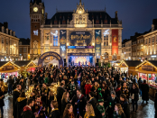 Crowd dressed in Harry Potter costumes at lit Roubaix town hall for Harry Potter Night event